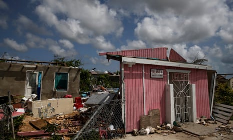 Ruined homes and businesses in Codrington, Barbuda, a month after Hurricane Irma struck.