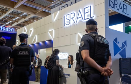 Uniformed officers in front of the stand