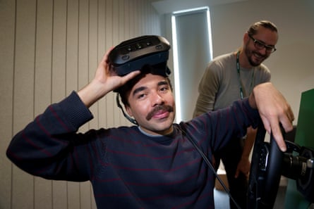 Raphael Boyd takes part in a driving simulation run by the National Highways agency and Arup