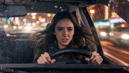 An AI generated image of AI actress Tilly Norwood driving a car.