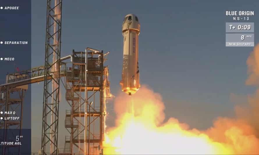 A Blue Origin rocket lifts off from its launchpad in Texas.