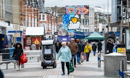 shoppers on the Southend high street with Christmas street decorations overhead