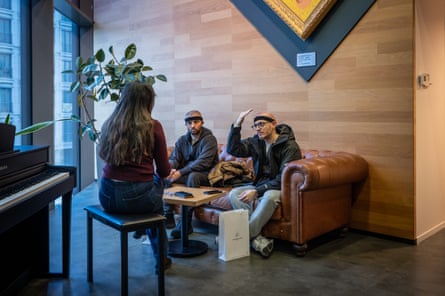 People chatting on a sofa