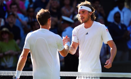 Andy Murray congratulates Stefanos Tsitsipas on his second-round win at Wimbledon.