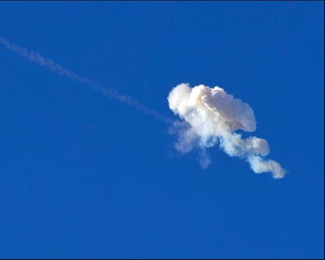 An Israeli interceptor strikes an Iranian ballistic missile over the Jerusalem area on Monday