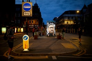 3 June – A new mural by street artist Akse, being painted in the Northern Quarter, Manchester, of George Floyd
