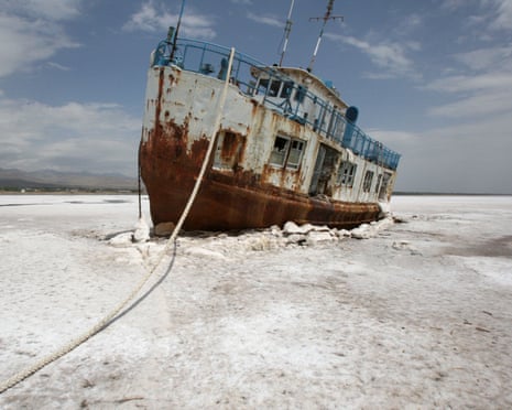 An abandoned ship stuck in the solidified salts of the Oroumieh Lake, Iran