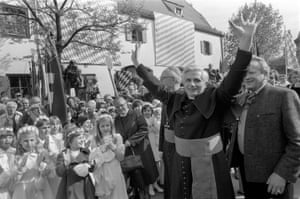 The new archbishop of Munich and Freising greets the faithful at his arrival in Munich, in 1977