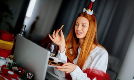 Woman having a Christmas celebration via video call. 