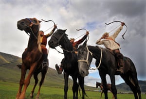 Contestants in the horseback archery