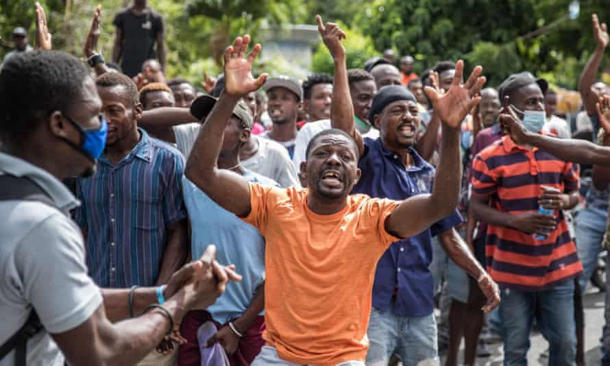 The crowd near the police station where the armed men accused of involvement in the assassination of president Jovenel Moise were detained in Port au Prince, Haiti.