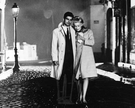 evocative black and white street scene from the umbrellas of cherbourg