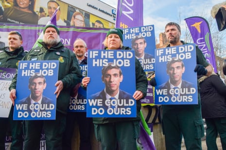 Striking ambulance staff on picket line outside the London ambulance service HQ in Waterloo, London, today.