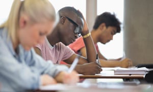 University students taking exam.