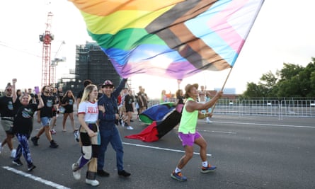 WorldPride Pride March revellers cross Sydney Harbour Bridge