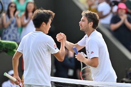 Cameron Norrie congratulates Michael Zheng connected his victory