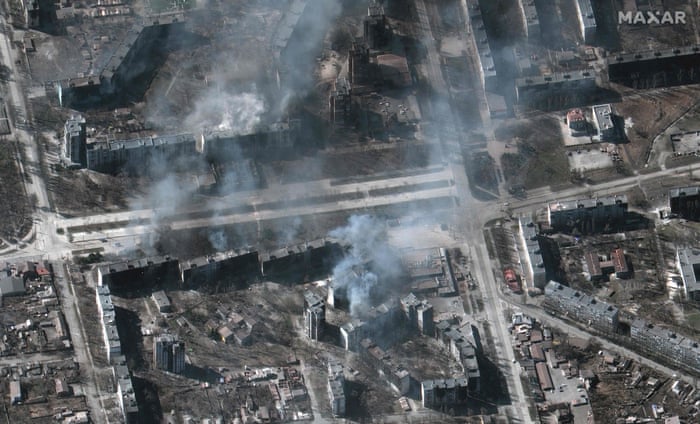 This Maxar satellite image taken and released on March 22 shows buildings on fire in Mariupol, Ukraine