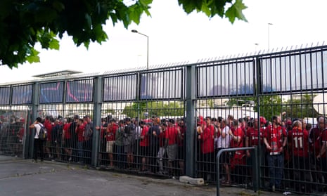 Liverpool fans wait to enter the Stade de France for the Champions League final.