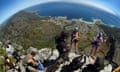 Travellers abseiling down Table Mountain in Cape Town, South Africa. TRV