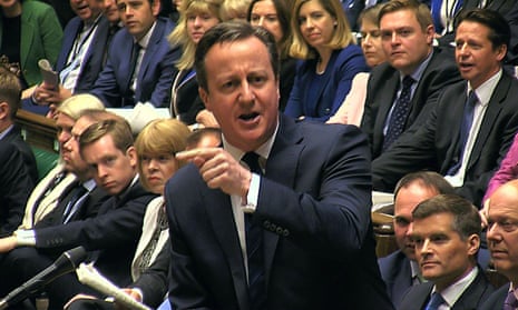 David Cameron gestures as he responds to a question in the House of Commons.