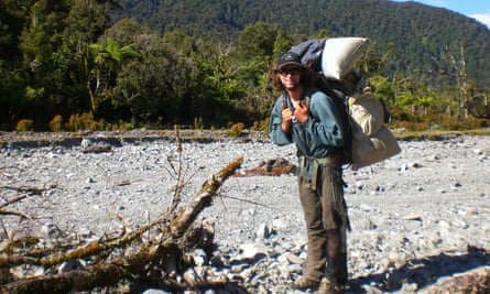 Chris Long with a backpack loaded with 40kg of possum fur and skin after a hunt.