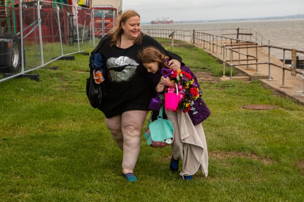 Anna Morell and her daugher leave All Hallows beach.