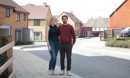 Local residents Danielle and Dominic Sambrook posing for a photograph in the street near their home in Ebbsfleet.