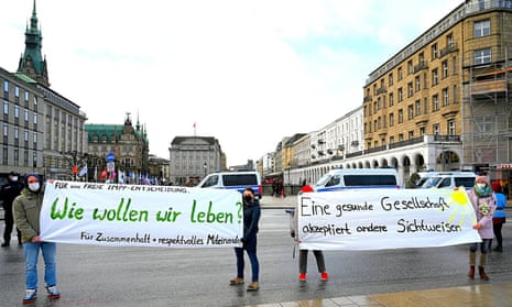 A demonstration against the Covid-19 measures at Jungferstieg in Hamburg, Germany.