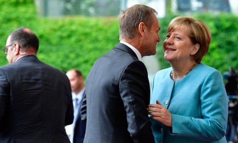 German Chancellor Angela Merkel welcomes President of the European Council Donald Tusk on June 29, 2017 at the Chancellery in Berlin ahead of a meeting with European G20 heads of state