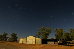 A shearing shed, the red soil of the Australian outback and a full moon provide the perfect setting for this nightscape image. In the upper left is the Southern Cross (Crux) and the two bright pointers to the cross, situated just below
