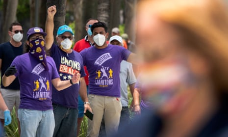 Unemployed workers attend a demonstration to demand unemployment benefits in Miami Beach, Florida, on 22 May. 