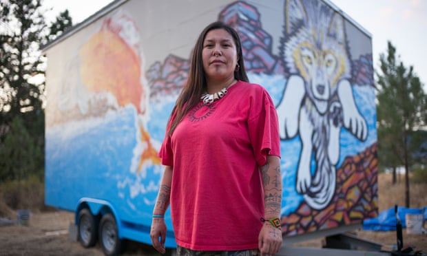 Secwepemc activist Kanahus Manuel in front of a tiny house being built in path of Kinder Morgan pipeline’s planned route through her Nation’s territory in British Columbia, Canada.