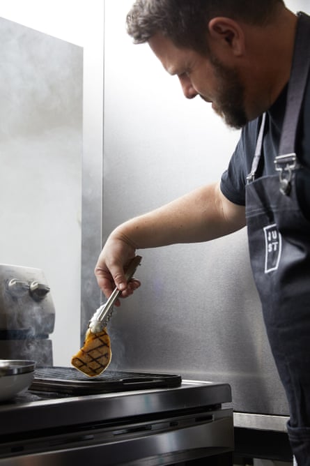 just inc chef nate grills a piece of cultured chicken at their offices in san francisco