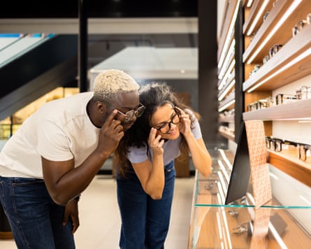 Young mates buying glasses