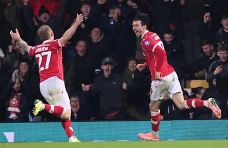 Lewis O’Brien races to congratulate Kieffer Moore after his third goal for Wrexham