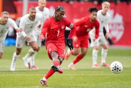 Canada’s Jonathan David scores from the spot against Iceland