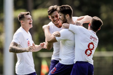 Matt Crossen celebrates with his England teammates during their 2-0 win over Germany at the European Championship in 2018.