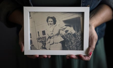 Stacy Cordova, whose aunt was a victim of California’s forced sterilization program that began in 1909, holds a framed photo of her aunt Mary Franco, who was sterilised in the 1930s.