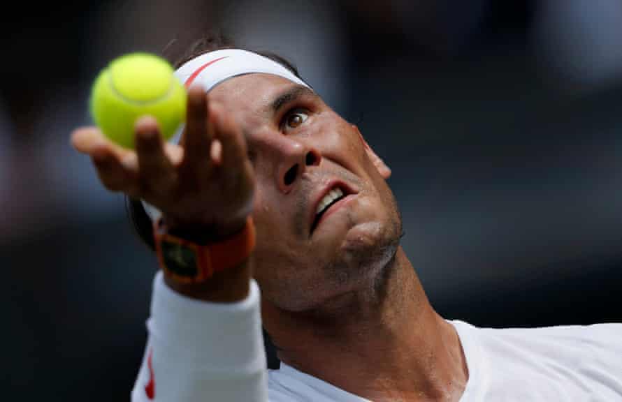 FIFAPRO Tom Jenkins’s best sports photos of 2018 17 Rafael Nadal of Spain serves during his victory on Centre Court during day four of the 2018 Wimbledon tennis championships.