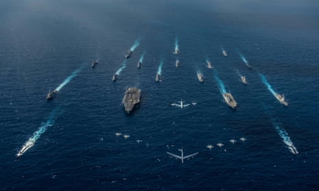 US and Japanese forces sail in formation in the Philippine Sea during multinational military exercises in 2018