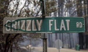 A partially melted street sign on Grizzly Flat Road.