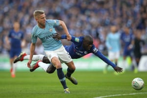 Kante goes to ground under pressure from Zinchenko.