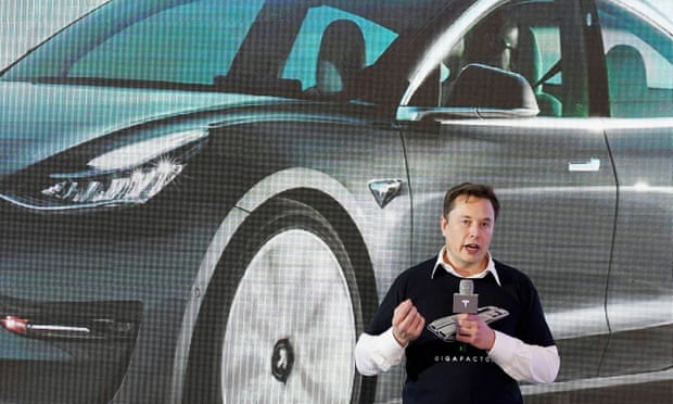 Elon Musk speaking at a delivery event in Shanghai, China, in January.