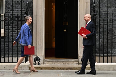 Yvette Cooper, the foreign secretary, and John Healey, the defence secretary, arriving for cabinet this morning.