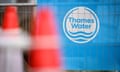 The Thames Water logo seen on protective fencing around a pipework replacement site