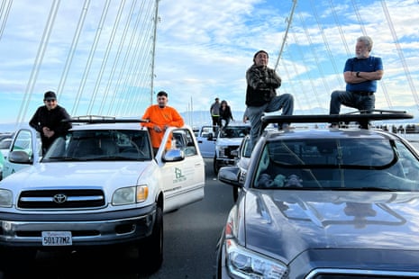 Motorists wait in a queue as demonstrators shut down the San Francisco Oakland Bay Bridge in calls for a ceasefire in Gaza on Thursday, Nov. 16, 2023, in San Francisco.