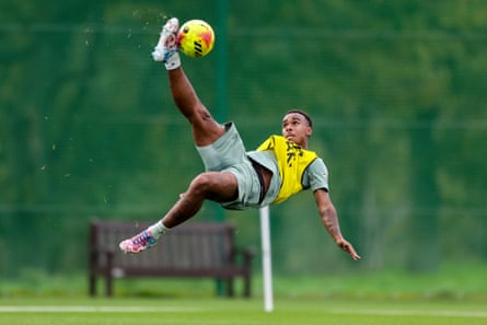 Eli Junior Kroupi hones his acrobatic skills during a Bournemouth training session.