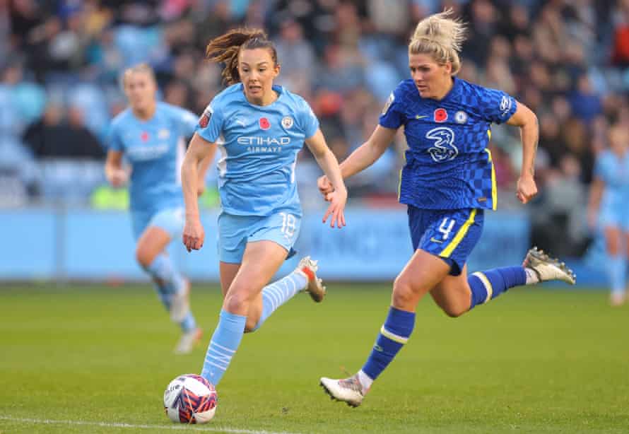 Caroline Weir tries to pull away from Millie Bright in November's 4-0 Chelsea win.