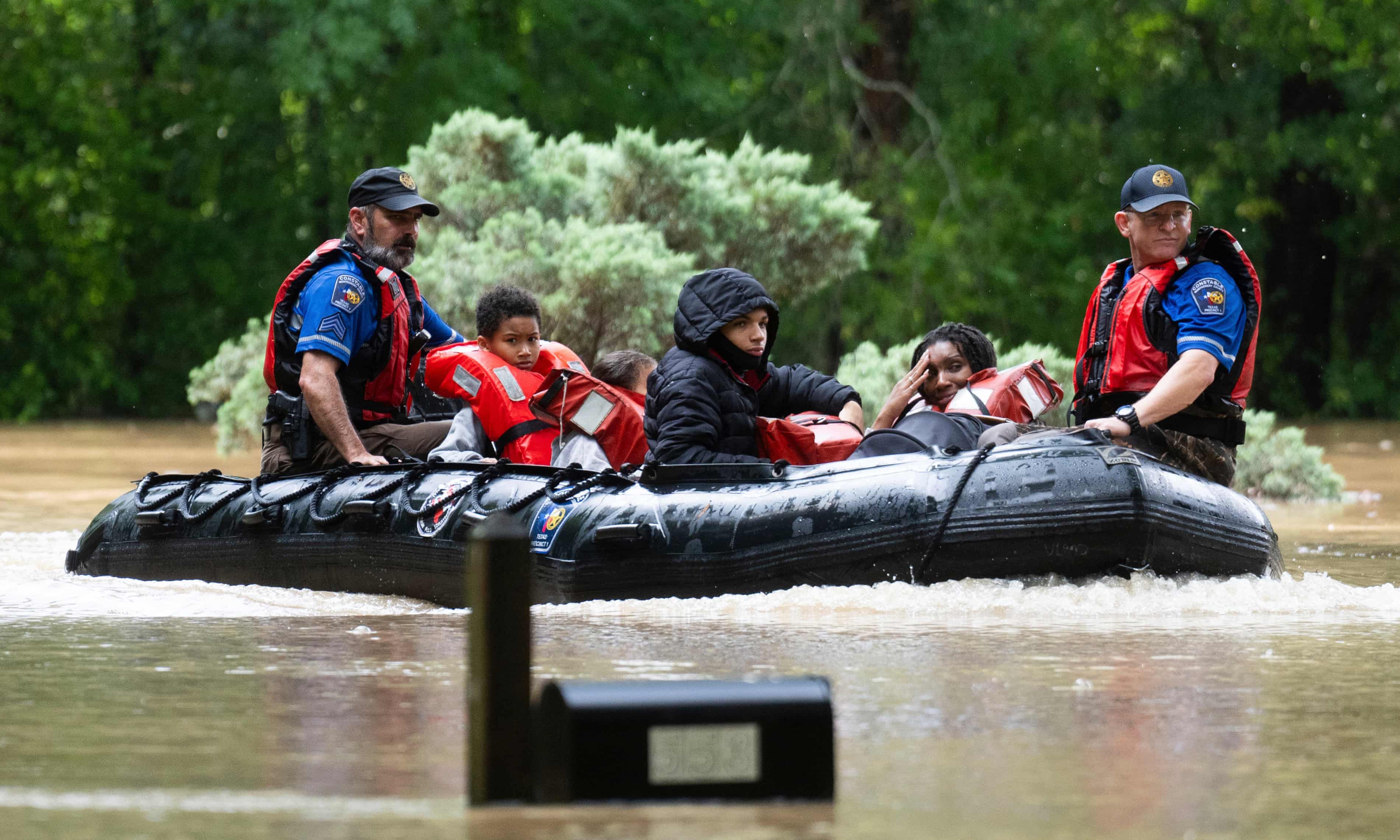 At least 400 rescued from flooding in Texas as waters continues rising (theguardian.com)