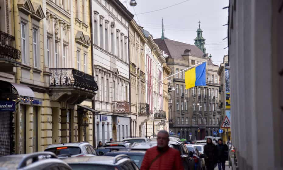  A Ukrainian national flag hangs from a building in downtown Lviv.